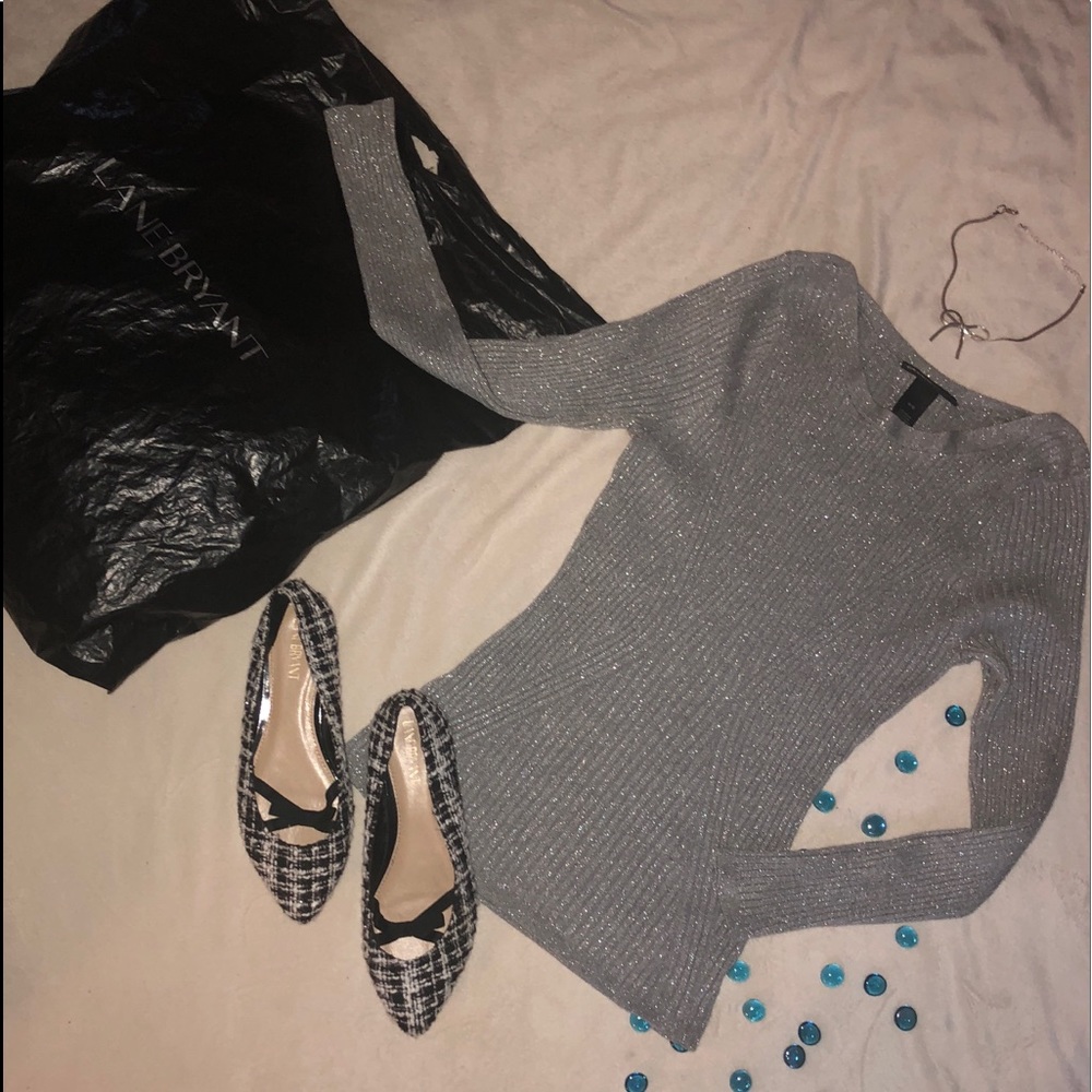 Shiny silver thin sweater with slimming lines
